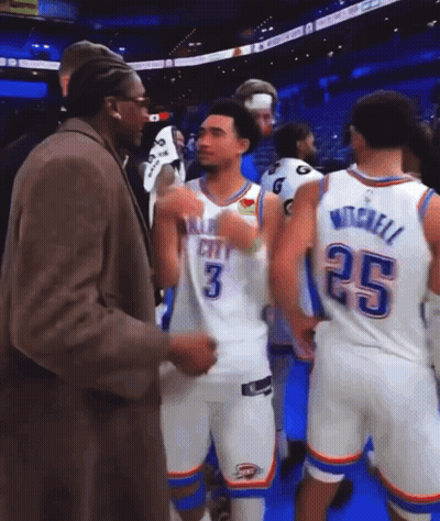 Man In Suit Talking To Player Number 3 GIF
