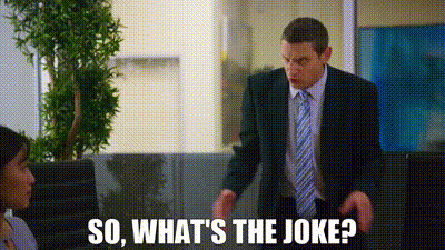 Man In Suit Talking To Woman In Office GIF