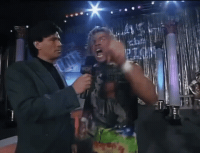 Man In Suit Talking To Wrestler Saying Ever GIF