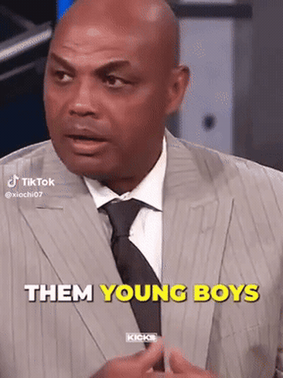 Man In Suit Talking To Young Boy GIF