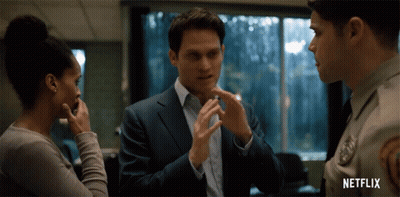 Man In Suit Talks To Woman And Police Officer Netflix GIF
