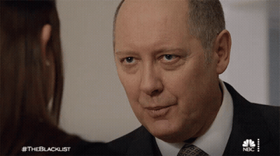 Man In Suit Talks To Woman #Theblacklist GIF