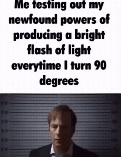 Man In Suit Testing Newfound Powers Meme GIF