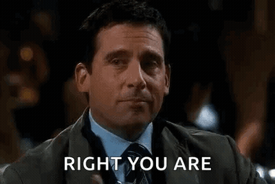 Man In Suit Thumbs Up Holding Glass Of Water GIF