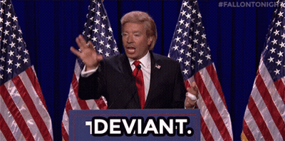 Man In Suit Tie At Podium Deviant GIF