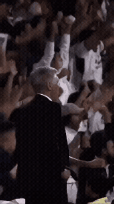 Man In Suit Tie Crowd Player 0 GIF