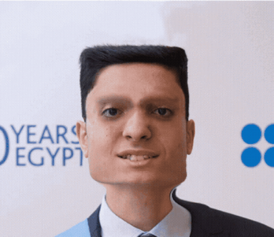 Man In Suit Tie Facing Years Egypt Sign GIF