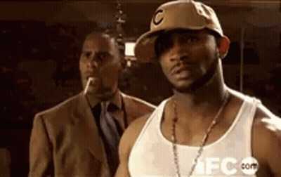 Man In Suit Tie Funny Face Colorful Hat GIF