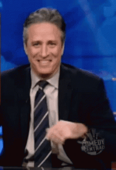 Man In Suit Tie Smiling Comedy Central Shirt GIF