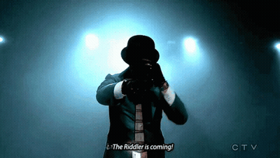 Man In Suit Top Hat Says Riddler Coming GIF