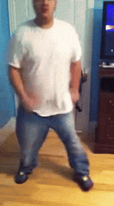 Man In Suit Tying His Tie GIF