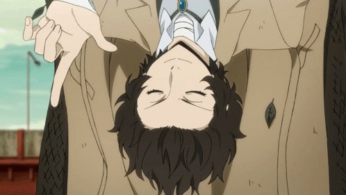 Man In Suit Upside Down Giving Thumbs Down GIF