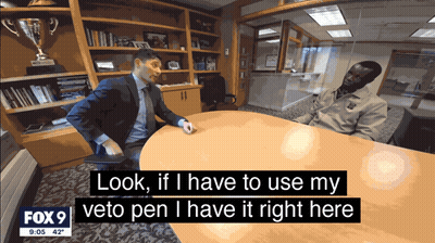 Man In Suit Using Veto Pen GIF