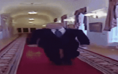 Man In Suit Walking Down Red Carpet GIF