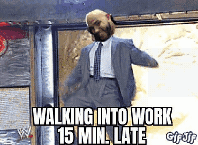 Man In Suit Walking Into Work 15 Min Late GIF
