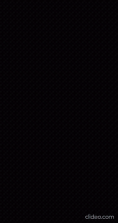 Man In Suit Walking On Dark Street GIF