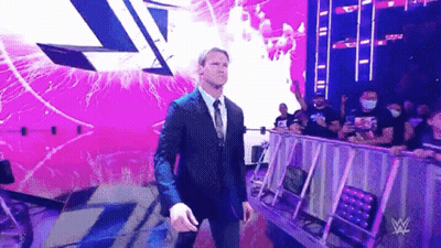 Man In Suit Walking Out Of Wrestling Arena GIF