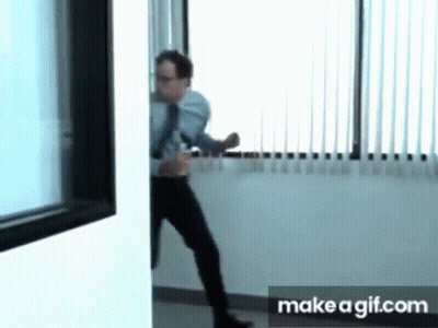 Man In Suit Walking Through Doorway GIF
