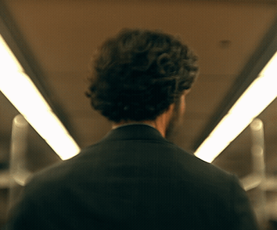 Man In Suit Walking Tunnel GIF