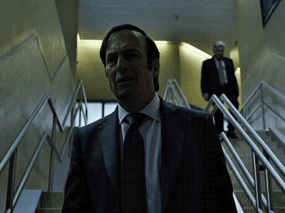 Man In Suit Walking Up Stairs GIF