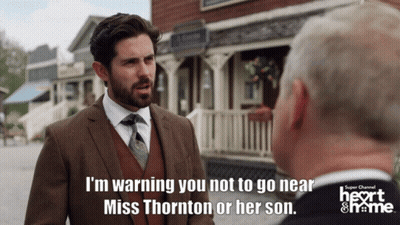 Man In Suit Warning Another Man GIF