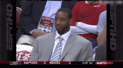 Man In Suit Watching Basketball On ESPN GIF