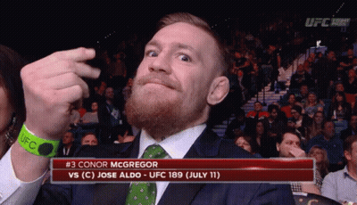 Man In Suit Watching UFC Match GIF