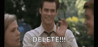 Man In Suit Waving And Saying Delete GIF