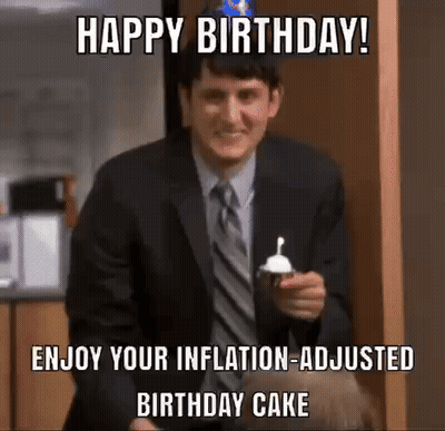 Man In Suit Waving Hands While Another Says Happy Birthday GIF