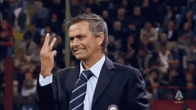 Man In Suit Waving GIF