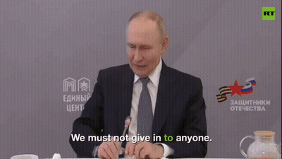 Man In Suit: We Must Not Give In To Anyone GIF