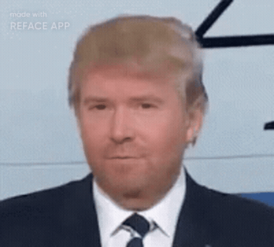 Man In Suit Wearing Fake Donald Trump Face GIF