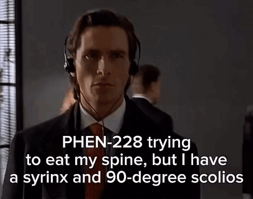 Man In Suit Wearing Headphones GIF