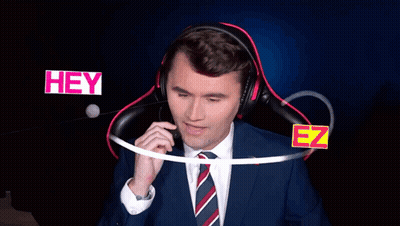Man in Suit Wearing Headphones Saying Hey Don't Say That