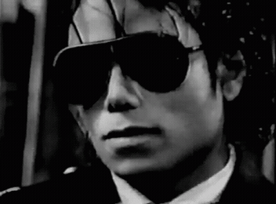 Man In Suit Wearing Sunglasses GIF