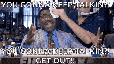 Man In Suit Wiped With Towel By Another Man GIF