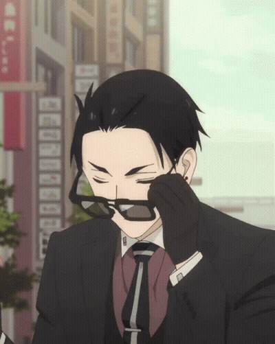 Man In Suit Wiping Glasses GIF