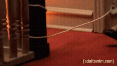 Man In Suit With American Flag And Chinese Writing GIF