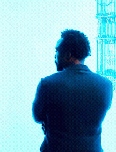 Man In Suit With Arms Crossed Blue Background GIF