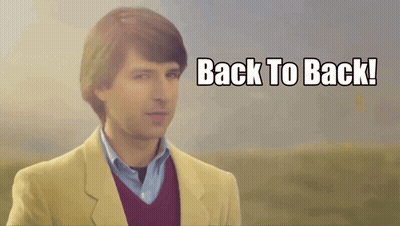 Man In Suit With Back To Back Sign GIF