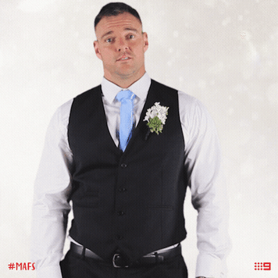 Man In Suit With Blue Tie And Flower GIF