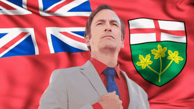 Man In Suit With British Flag GIF