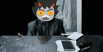 Man In Suit With Cartoon Face At Desk GIF