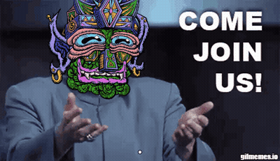 Man In Suit With Colorful Mask Pointing Come Join Us GIF