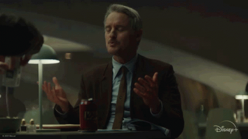 Man In Suit With Disney Plus Soda GIF