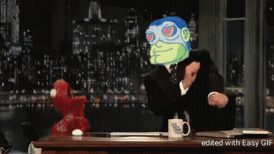 Man In Suit With Elmo And Late Night Talk Show Mug GIF