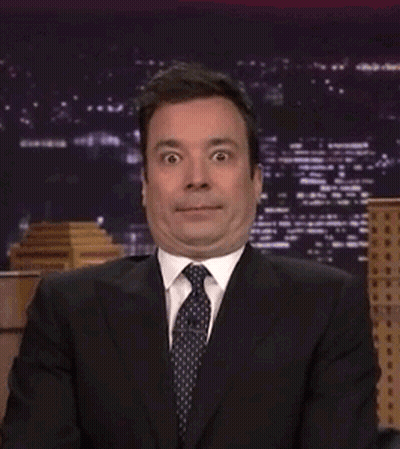 Man In Suit With Eyes Closed GIF