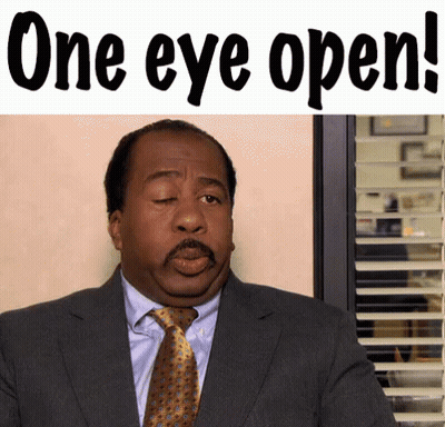 Man In Suit With Eyes Closed Saying One Eye Open GIF