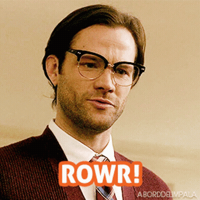 Man In Suit With Glasses Saying Rowr GIF