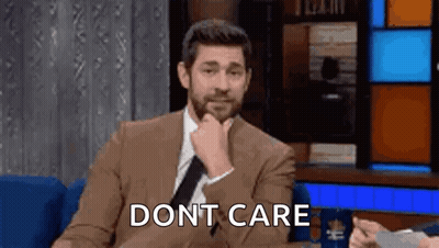 Man In Suit With Hand On Chin Saying Dont Care GIF